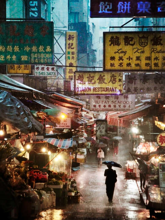   Market in the Rain by Christophe Jacrot