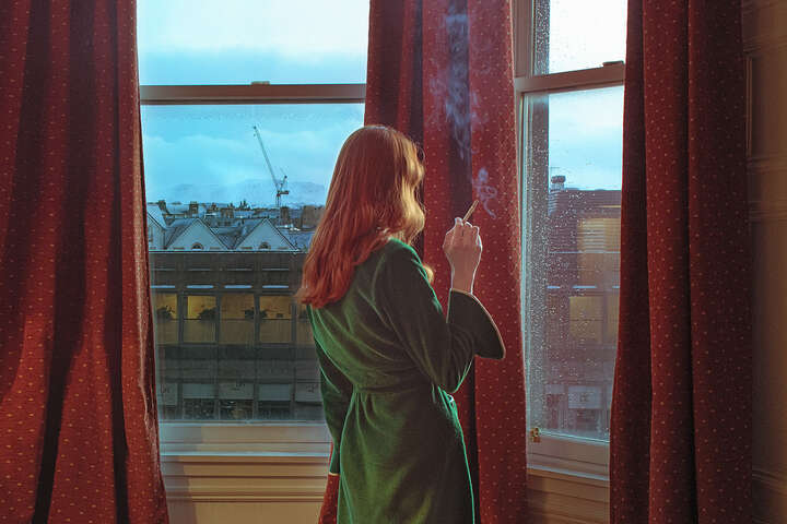 Woman Smoking At The Window by Diana Sosnowska