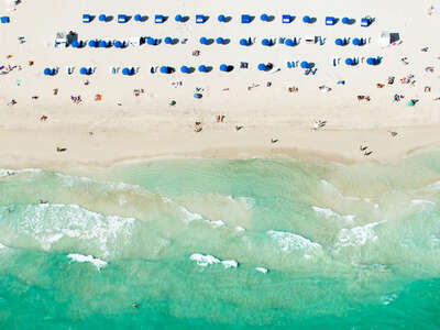   Blue Umbrellas Miami by Tommy Clarke